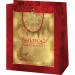 Borsa regalo esclusiva di medie dimensioni con scritta "Buon Natale", colore oro-rosso, 18x10x23 cm.